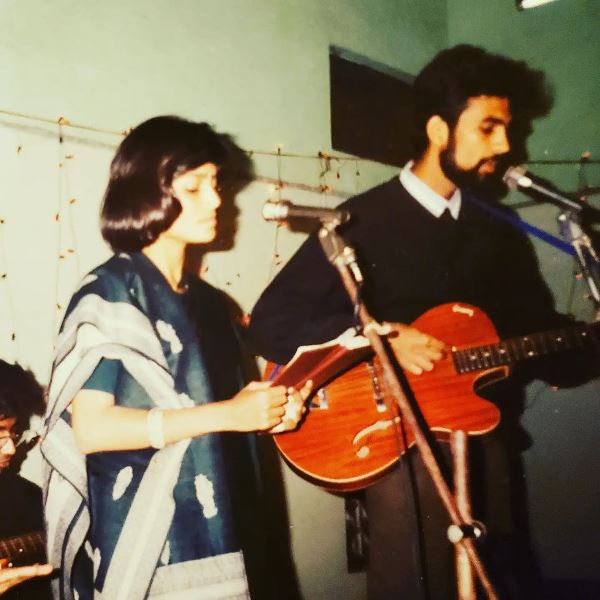 Vandana and Vishwas singing a duet at a friend's private event during their college days.