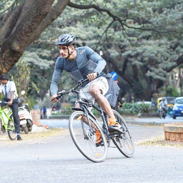 Photos of Gurpreet Singh Sandhu while riding a bike