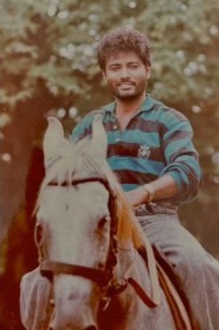 K. Shivaram while riding a horse
