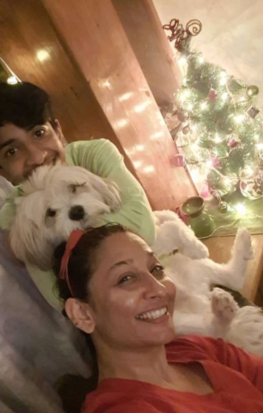 Shruti Panwar with her son Ojasya and her dog Olly.