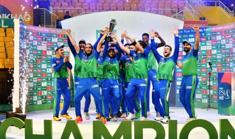 Muhammad Wasim (far right) poses with his team Multan Sultans after winning the 2021 Pakistan Super League (PSL).