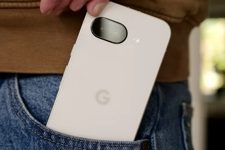 You asked: Nintendo Switch 2, the best Android phones and OLED upgrades 4 A person takes a Google Pixel 9a out of his pocket.