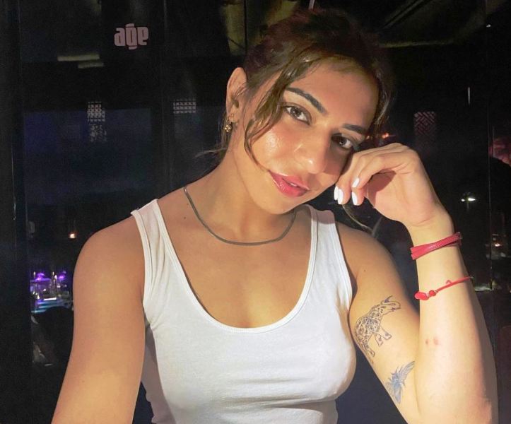 Eman Falcon Khan's bicep tattoo