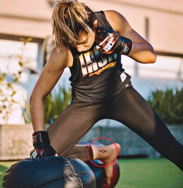 Eman Falcon Khan ankle tattoo