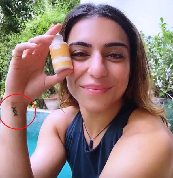 Eman Falcon Khan's wrist tattoo