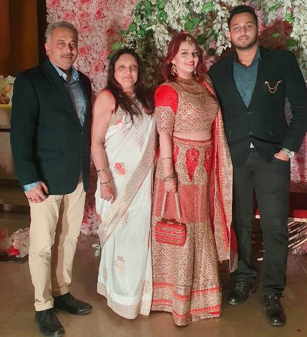 Nehalaxmi Iyer (in red) with her parents and siblings.