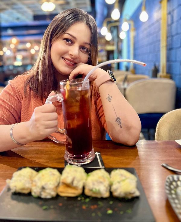 Nehalaxmi Iyer drinking beer