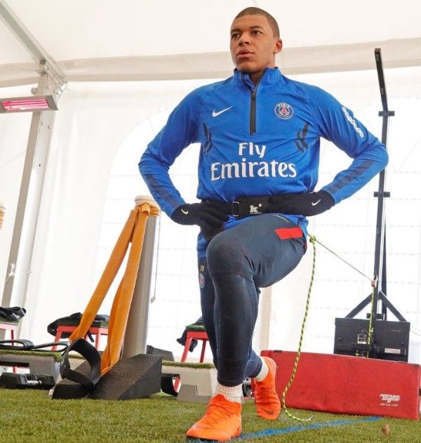Kylian Mbappe working out at the gym