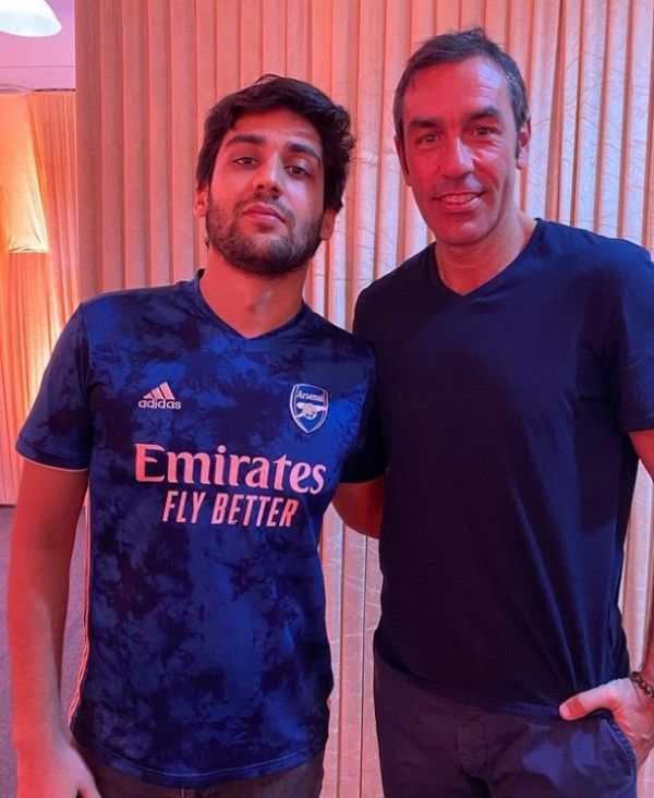 Rudraysh Joshii with retired Arsenal player Robert Pires (right)