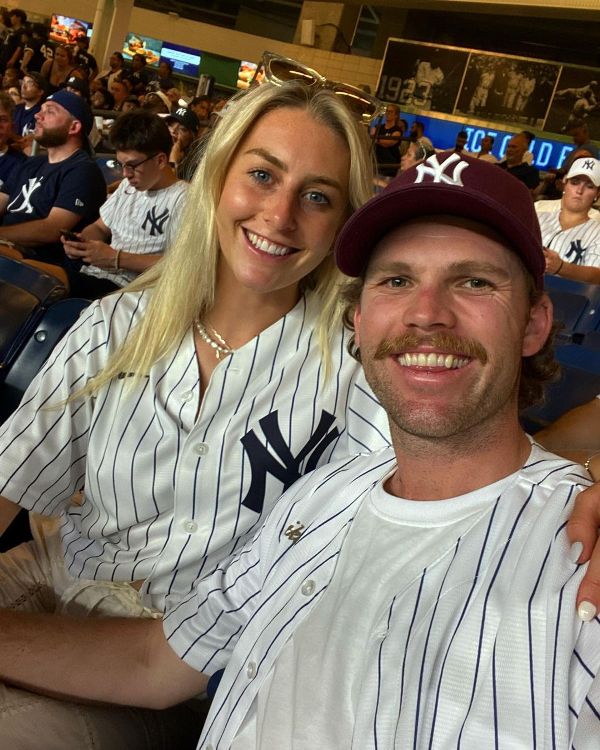 Lockie Ferguson (left) with Emma Komocki.