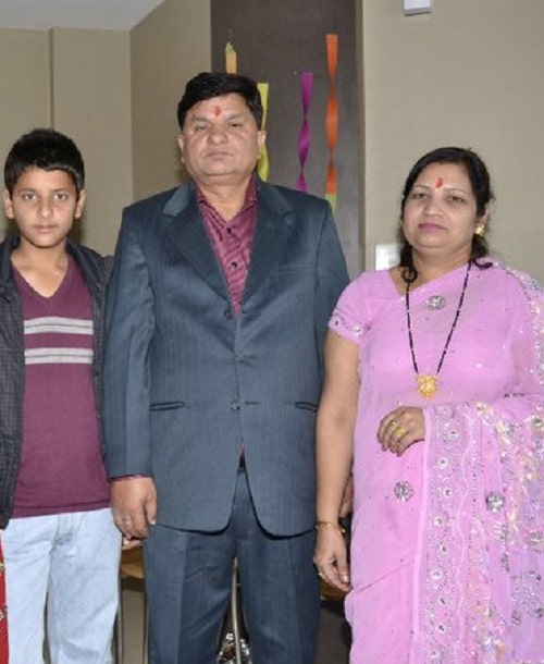 An old photo of Shivam Khajuria with his parents.