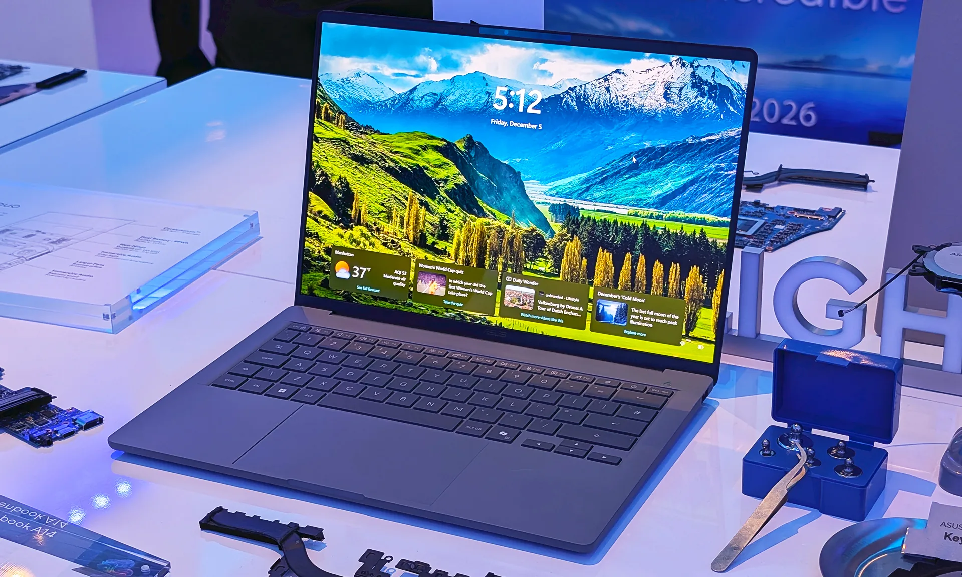 Windows laptops are finally getting better, but Microsoft may have missed the moment. 2 Zenbook A14 open on a white table.