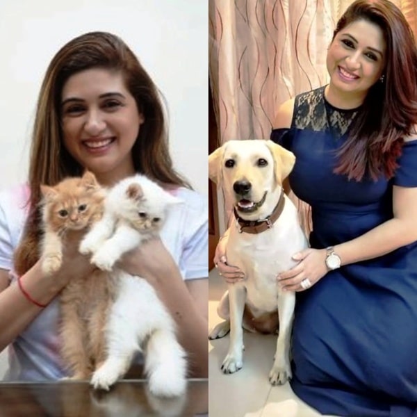 Vahbiz Dorabjee poses with her pet cat and dog.
