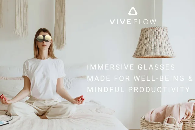 Peson meditates in bed wearing the HTC Vive Flow standalone VR headset.