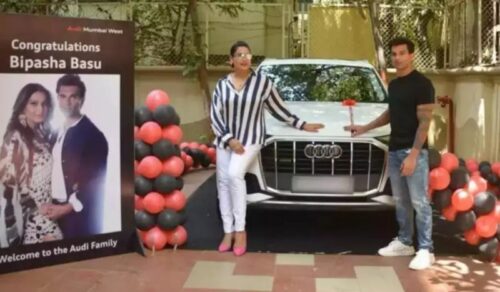 Bipasha Basu and Karan Singh Grover with their Audi Q7 car.