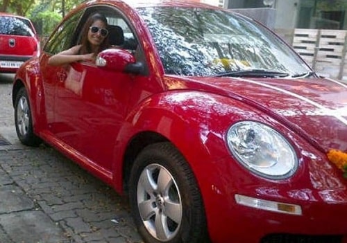 Bipasha Basu sitting in her car