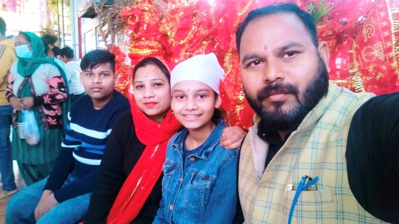 Kuldeep Kumar Dalor with his wife and children.