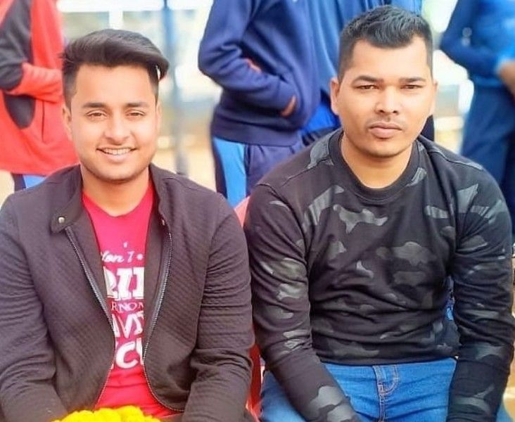 Sushant Mishra and coach Satyam Roy (right)