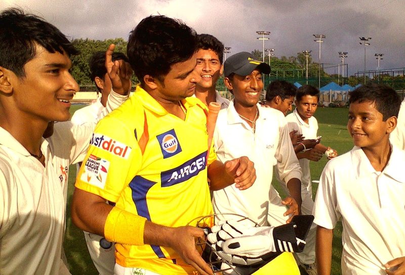 Sushant Mishra (far right) and Suresh Raina (yellow)