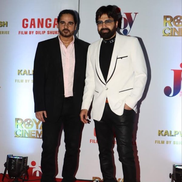 Monjoy and Sujoy Mukherjee at an event