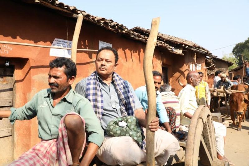 Raj Zutshi (second from left) in a still from the Hindi song Ghar Jana Hai.