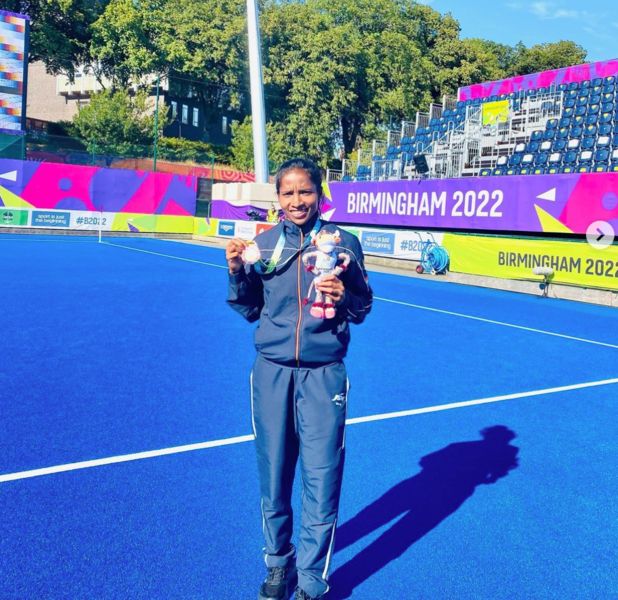 Nikki Pradhan poses with the 2022 Commonwealth Games bronze medal.