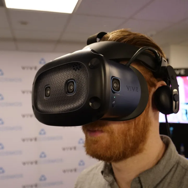 Put on your Vive Cosmos headset.