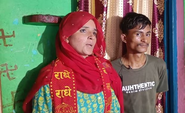 Seema Haider with her lover Sachin Meena wearing a Hindu robe with Radhe Radhe written on it.
