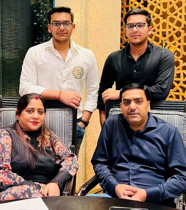 Nitin Kumar with his wife and son