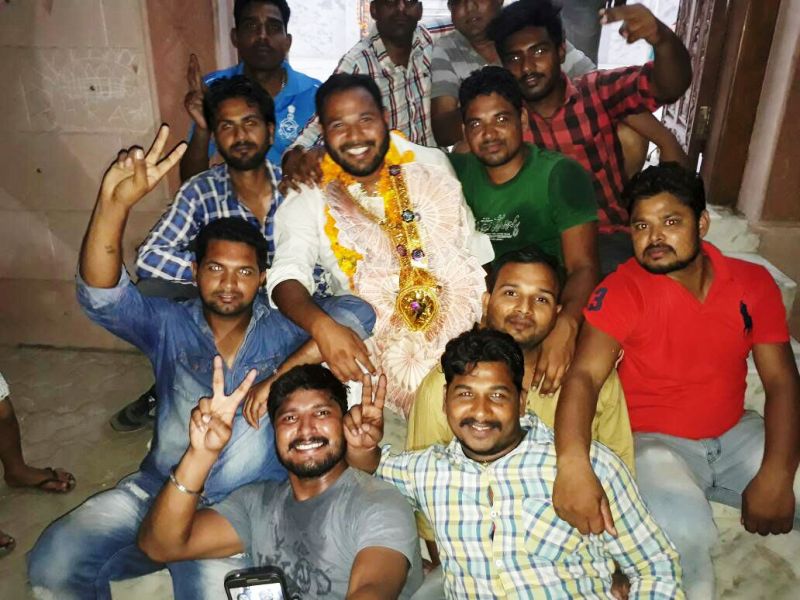 Kuldeep Kumar celebrates after becoming President and President Daddumajra of the Residents Welfare Association in 2017.