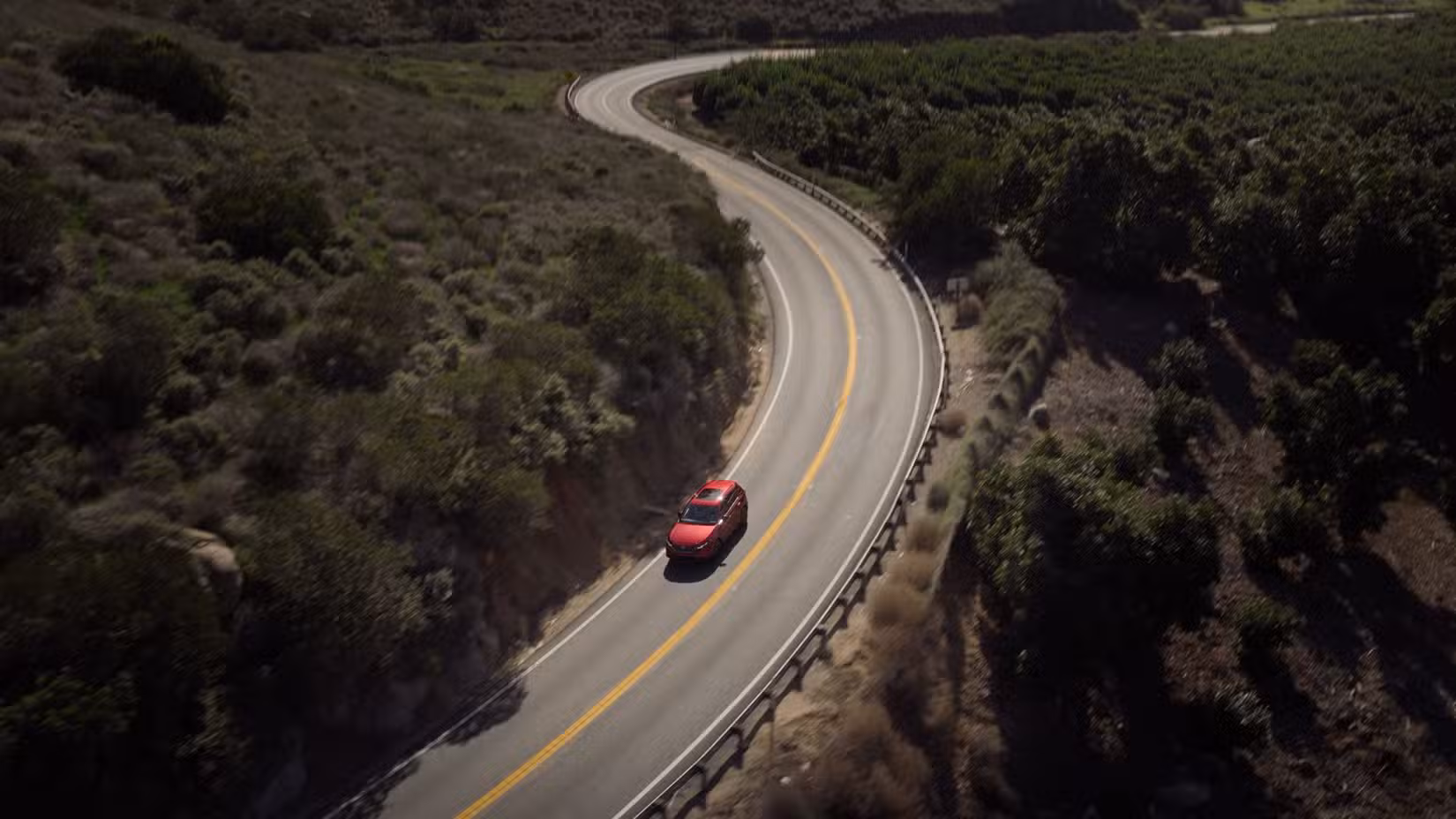 ریڈ 2026 مزدا CX-5 کا ڈائنامک اوور ہیڈ فرنٹ 3/4 شاٹ۔