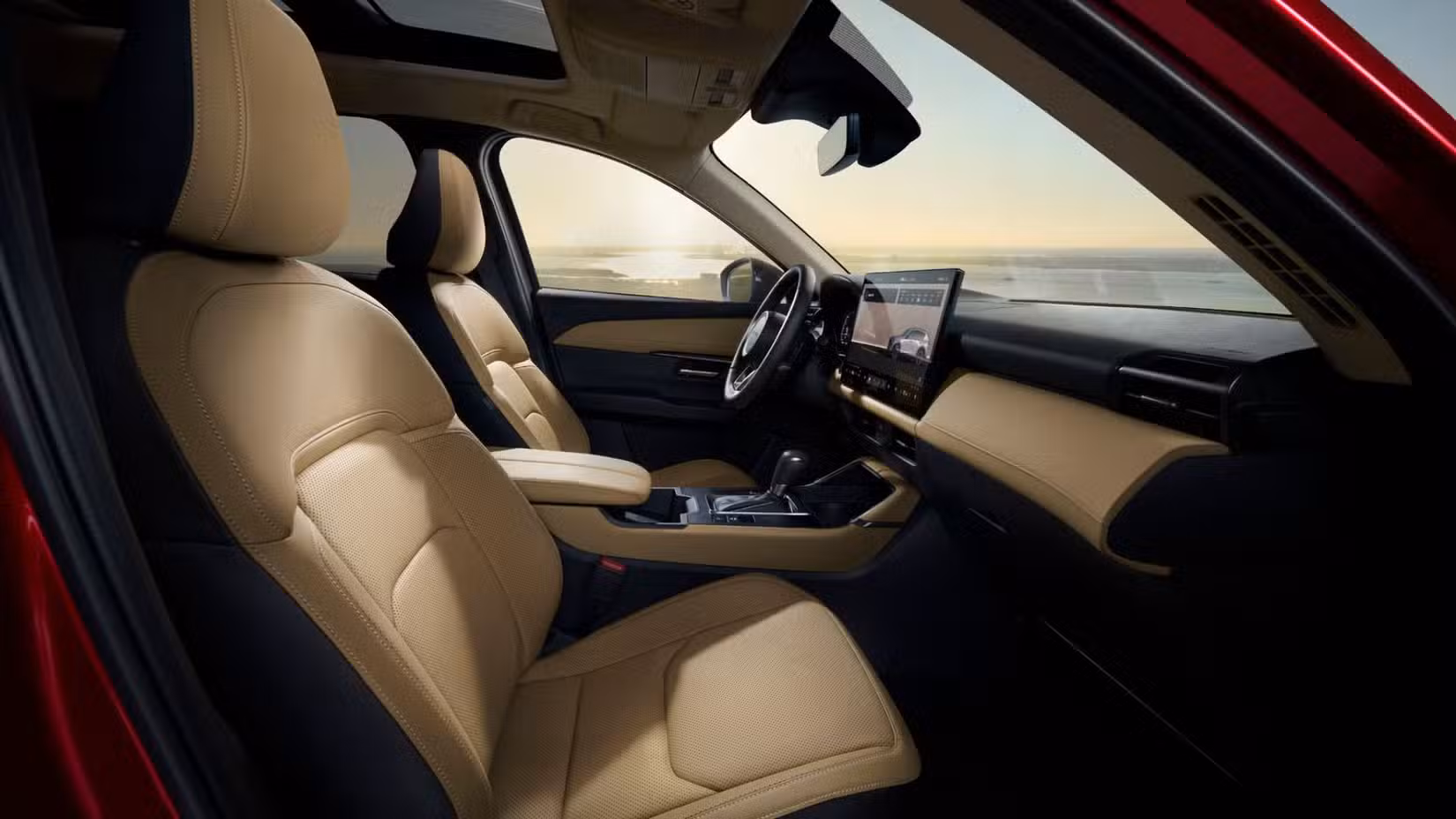 یہ 2026 Mazda CX-5 کے کیبن کے اندر اگلی سیٹوں اور ڈیش بورڈ کی تصویر ہے۔