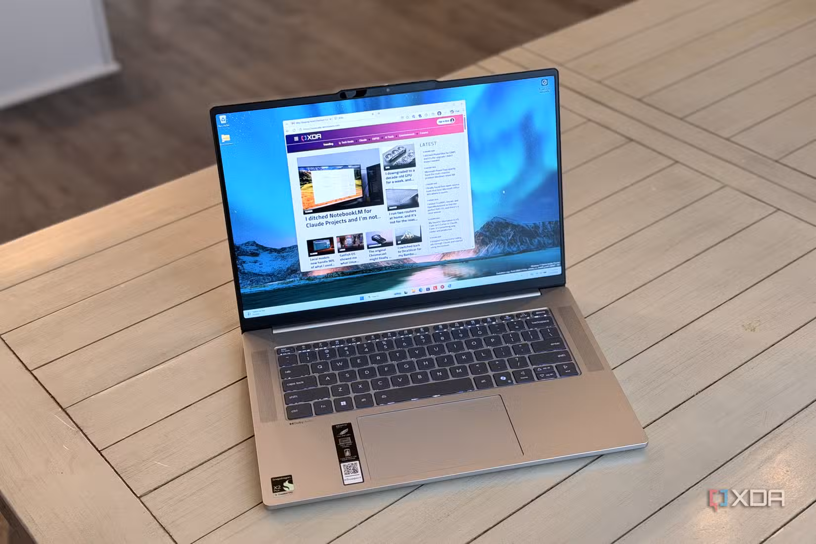 lenovo ideapad slim 5x gen 11 اسکرین پر xda ویب سائٹ دکھا رہا ہے۔